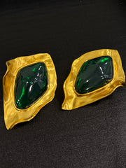 Gold-tone green cabochon-style sculptural clip-on earrings front view