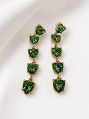 Gold-tone green crystal-style heart drop earrings close view