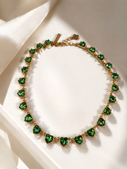 Gold-tone green crystal-style heart necklace in display box