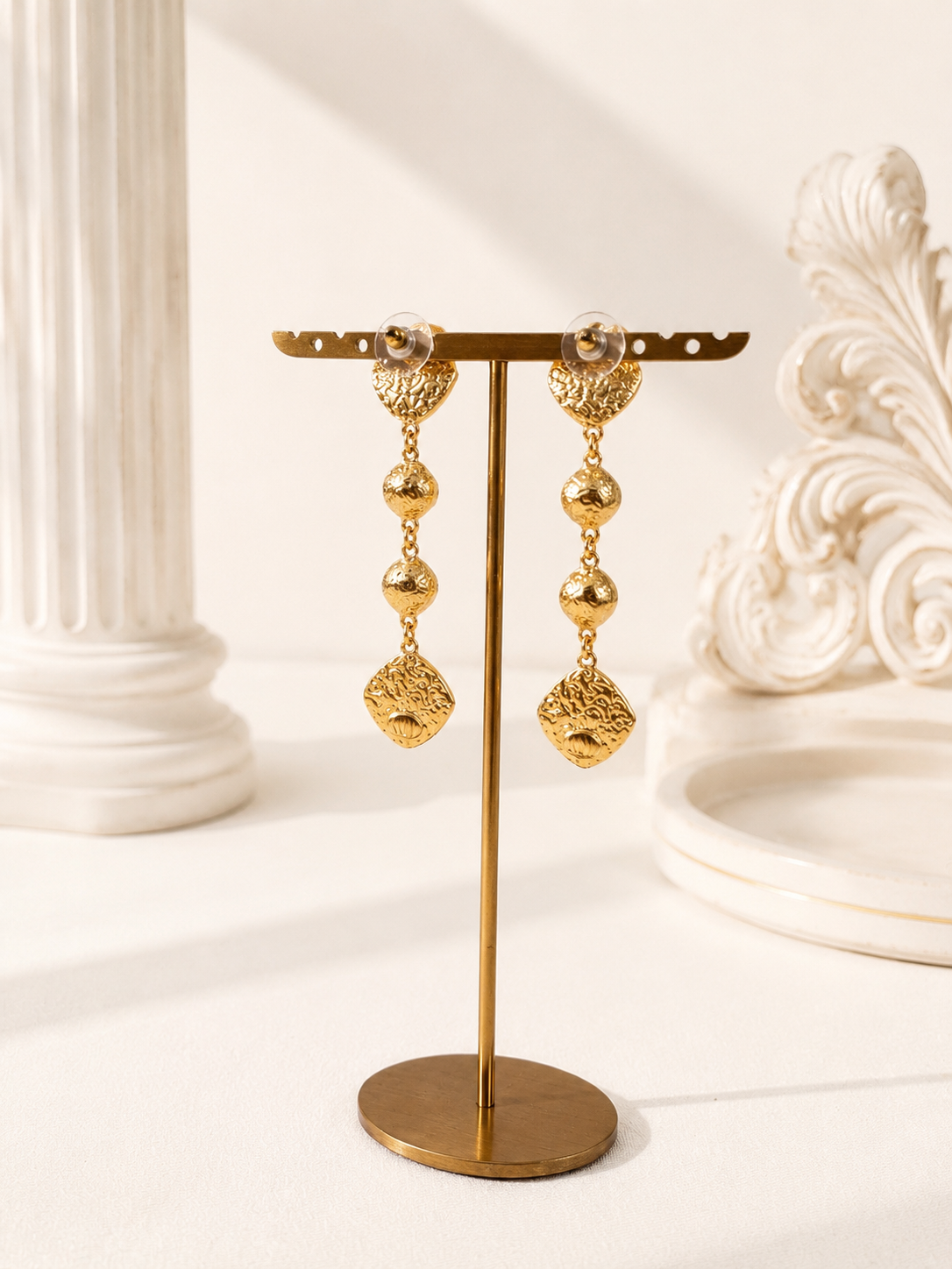 Gold-tone horse medallion drop stud earrings back view