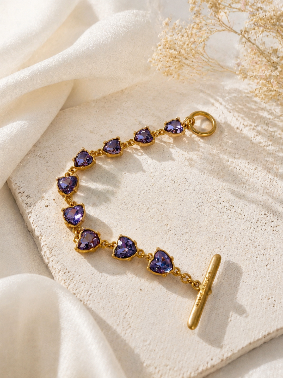 Gold-tone light purple heart crystal-style bracelet front view