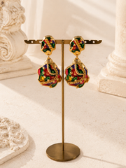 Gold-tone multicolor enamel-style drop stud earrings on display stand