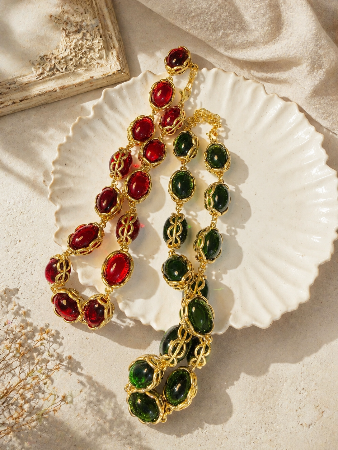 Gold-tone oval stone-style statement necklaces in red and green