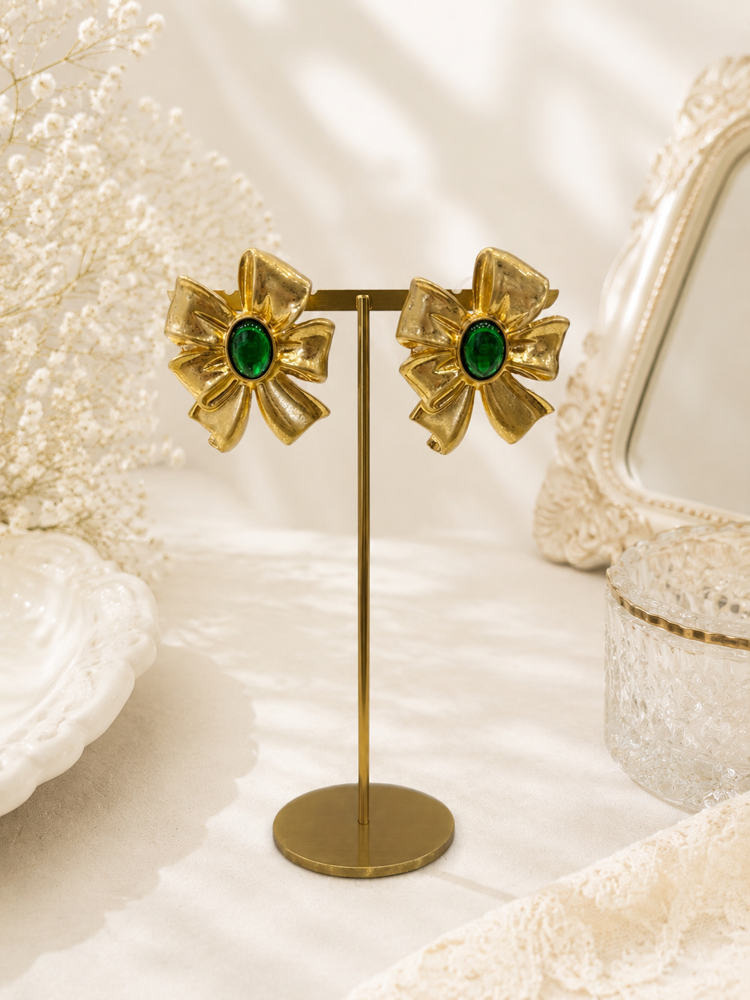 Green gold-tone oversized bow cabochon-style stud earrings display view