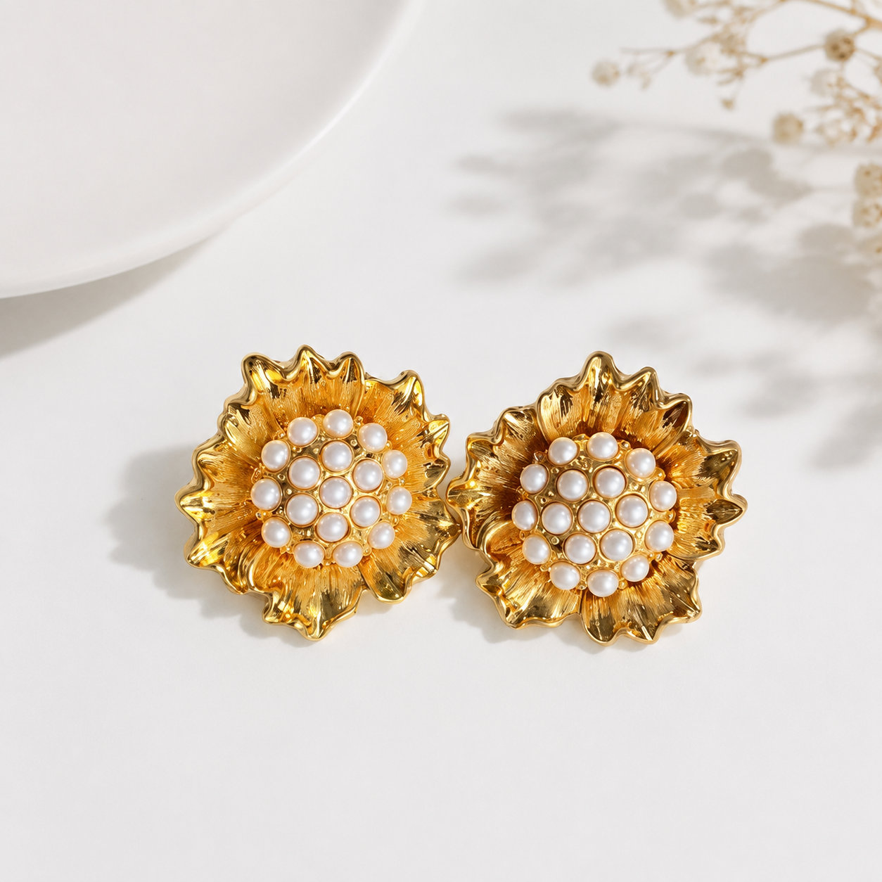 Gold-tone pearl-style floral clip-on earrings pair