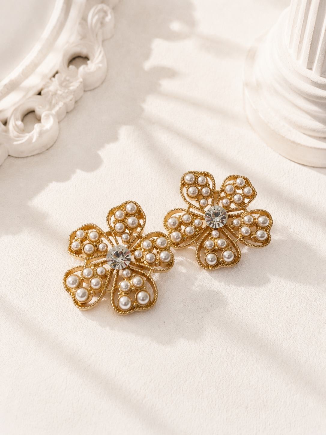 Gold-tone pearl-style-style flower stud earrings with clear crystal-style-style center