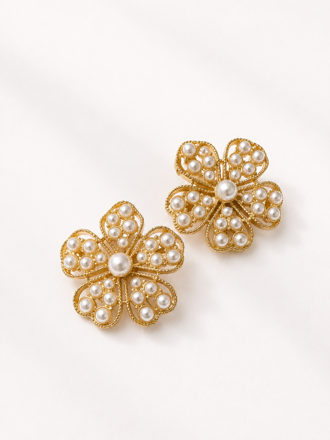 Gold-tone pearl-style-style flower stud earrings with pearl-style-style center