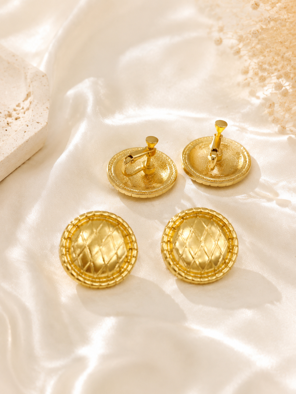 Gold-tone quilted button earrings with stud and clip-on fastening views