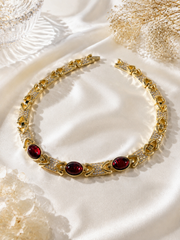 Gold-tone red glass choker necklace front view