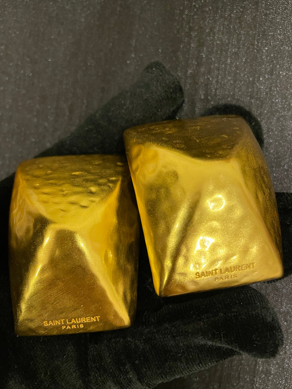 Gold-tone sculptural square clip-on earrings front view with visible front marking