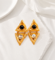 Gold-tone triangle clip-on earrings with black stone-style and clear crystal-style accents front view