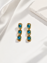 Aqua blue gold-tone triple cushion crystal-style drop earrings