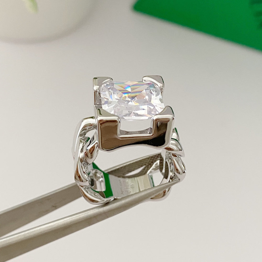 Silver-tone chain-link ring with clear square accent
