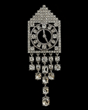 Shimmering silver-tone crystal-style clock statement brooch front view with dangling accents