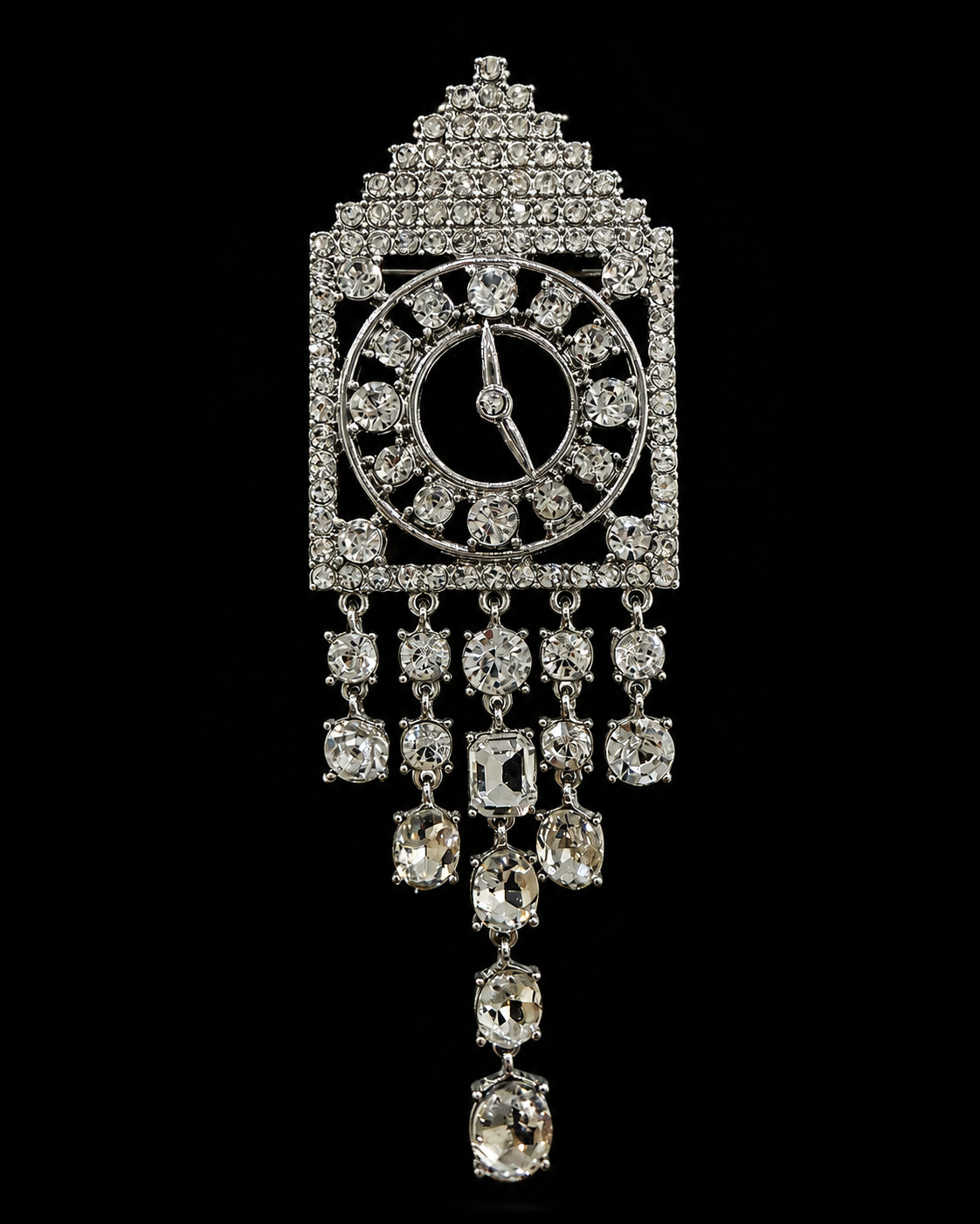 Shimmering silver-tone crystal-style clock statement brooch front view with dangling accents