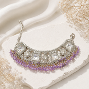 Silver-tone purple bead and crystal-style statement bracelet detail view