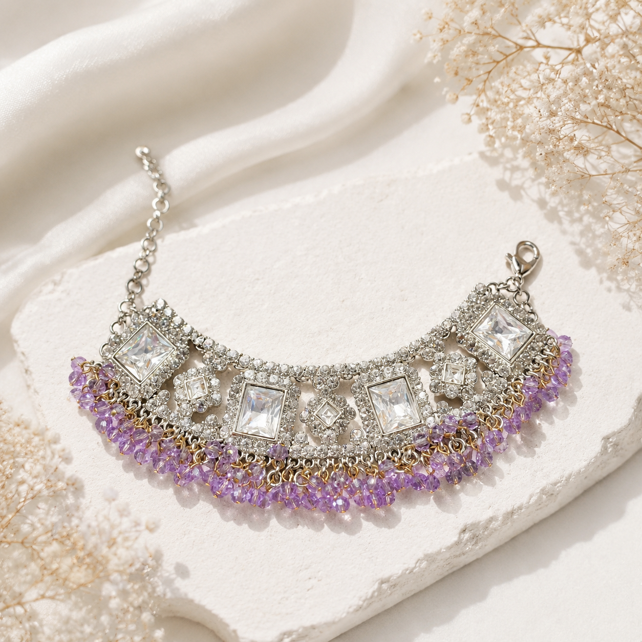 Silver-tone purple bead and crystal-style statement bracelet detail view