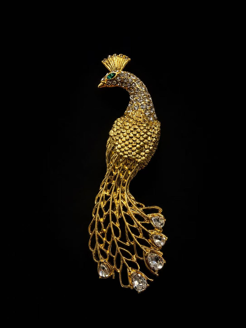 Vintage-inspired gold-tone peacock crystal-style statement brooch on black
